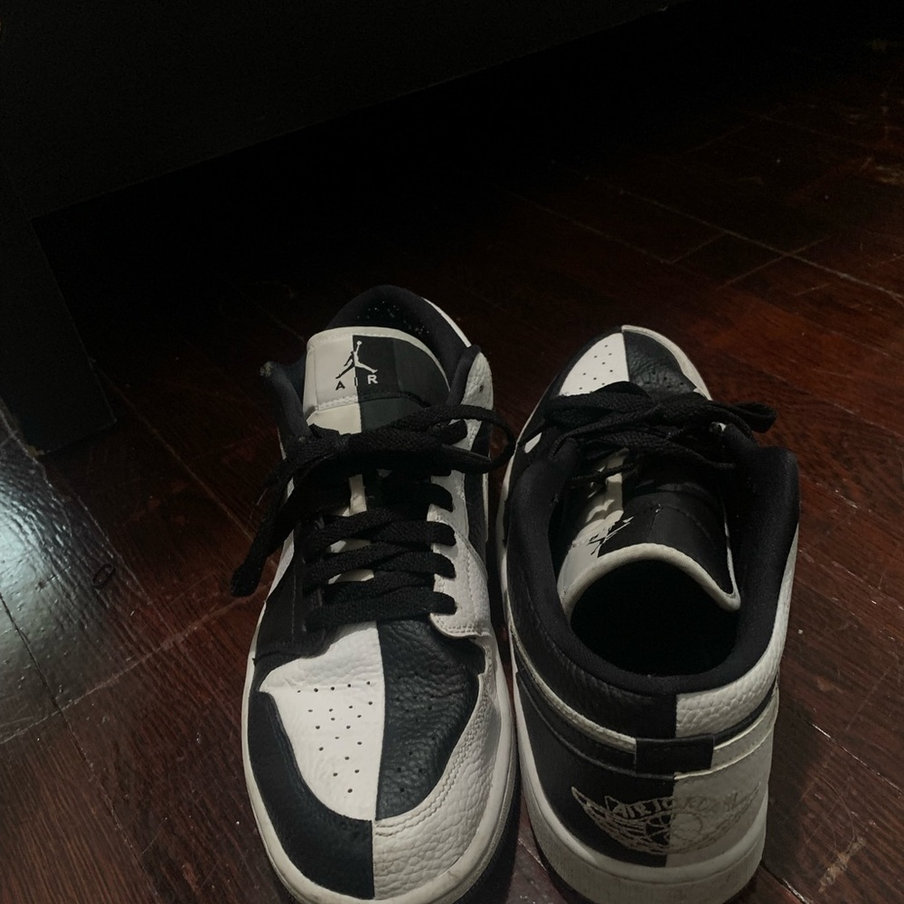 Nike jordan 1 lows, black and white split color. Size 11.5 women size 10 men.